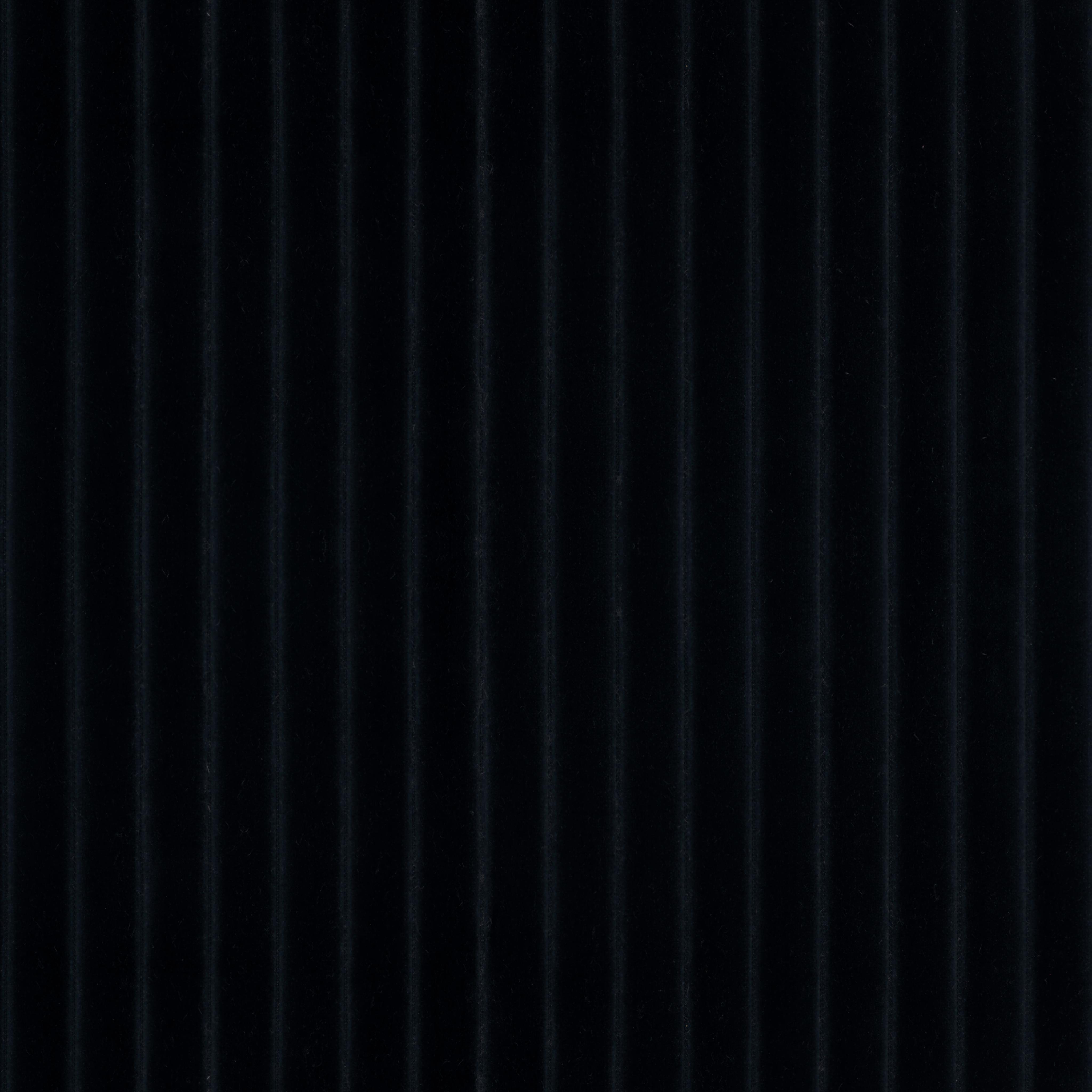 A seamless fabric texture with stripe black velvet units arranged in a None pattern