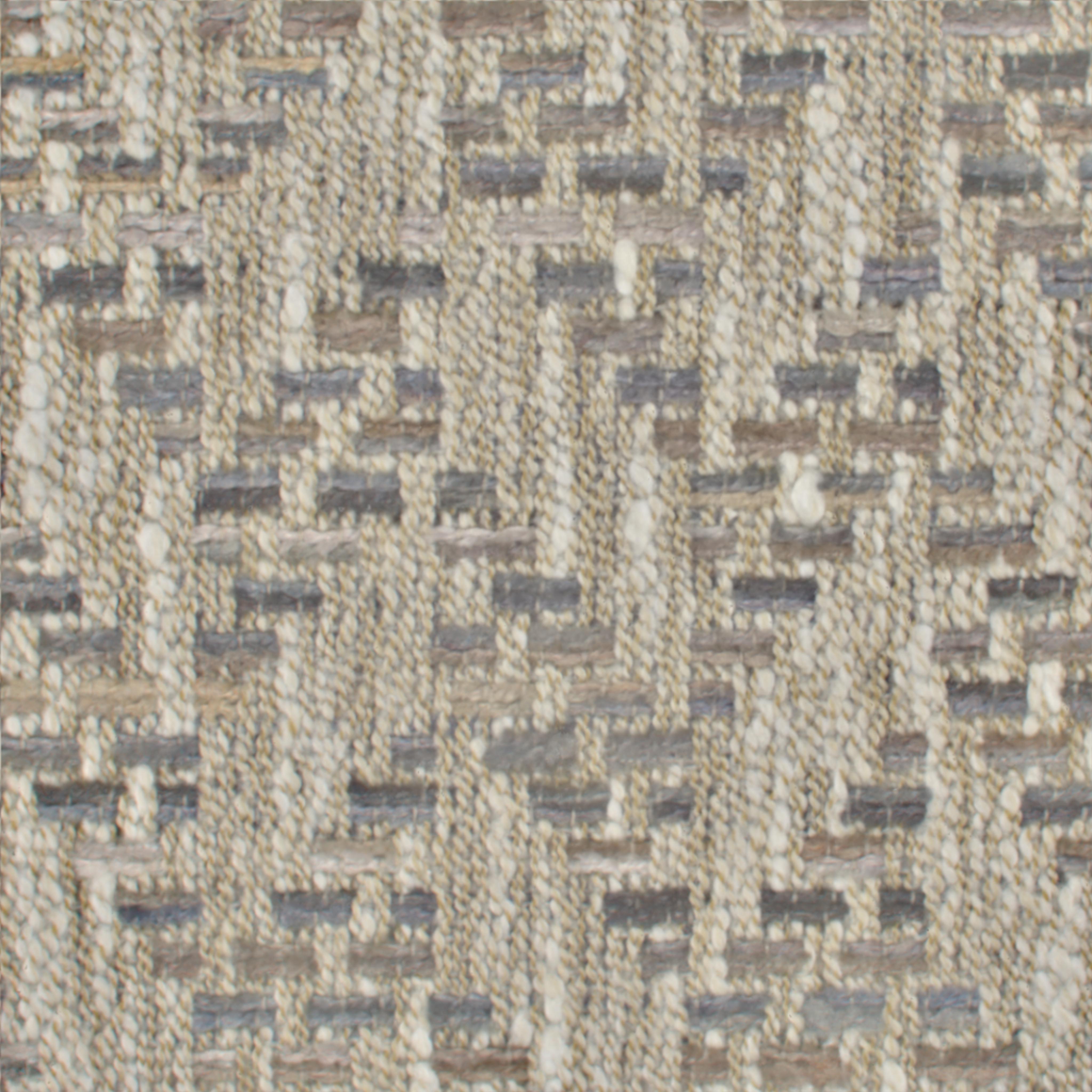 A seamless fabric texture with geometric blue jacquard units arranged in a None pattern