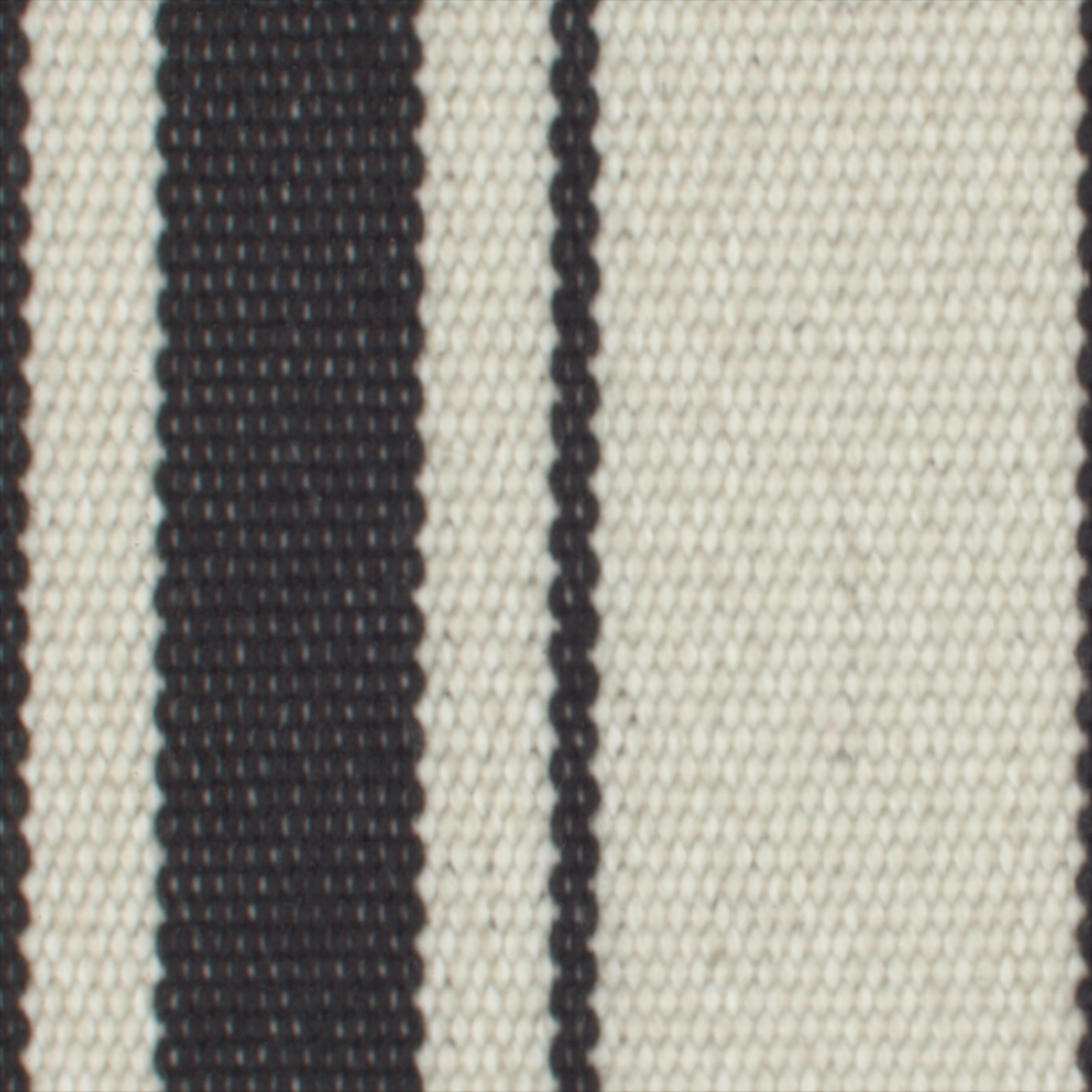 A seamless fabric texture with stripe black flat units arranged in a None pattern