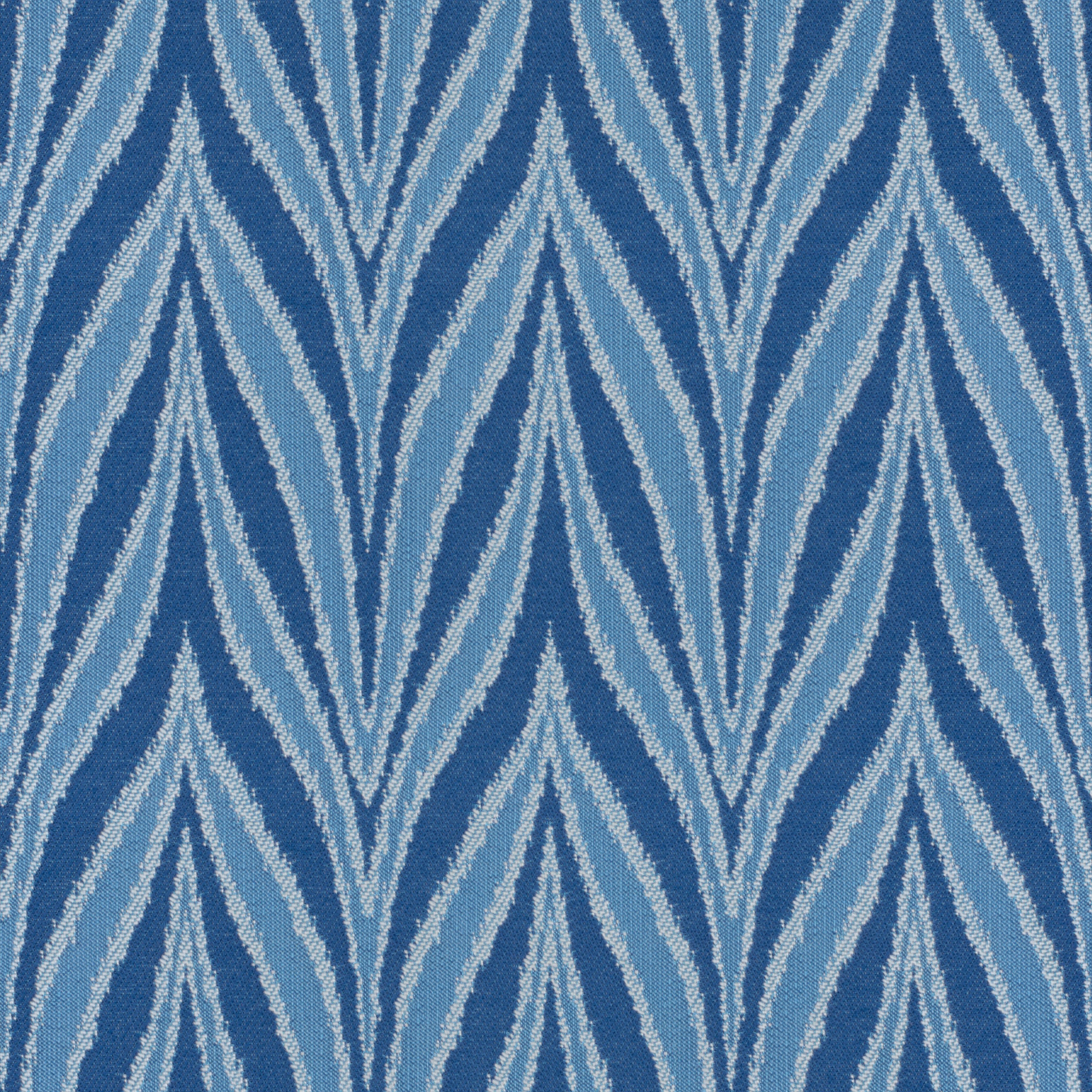 A seamless fabric texture with graphical blue jacquard units arranged in a None pattern