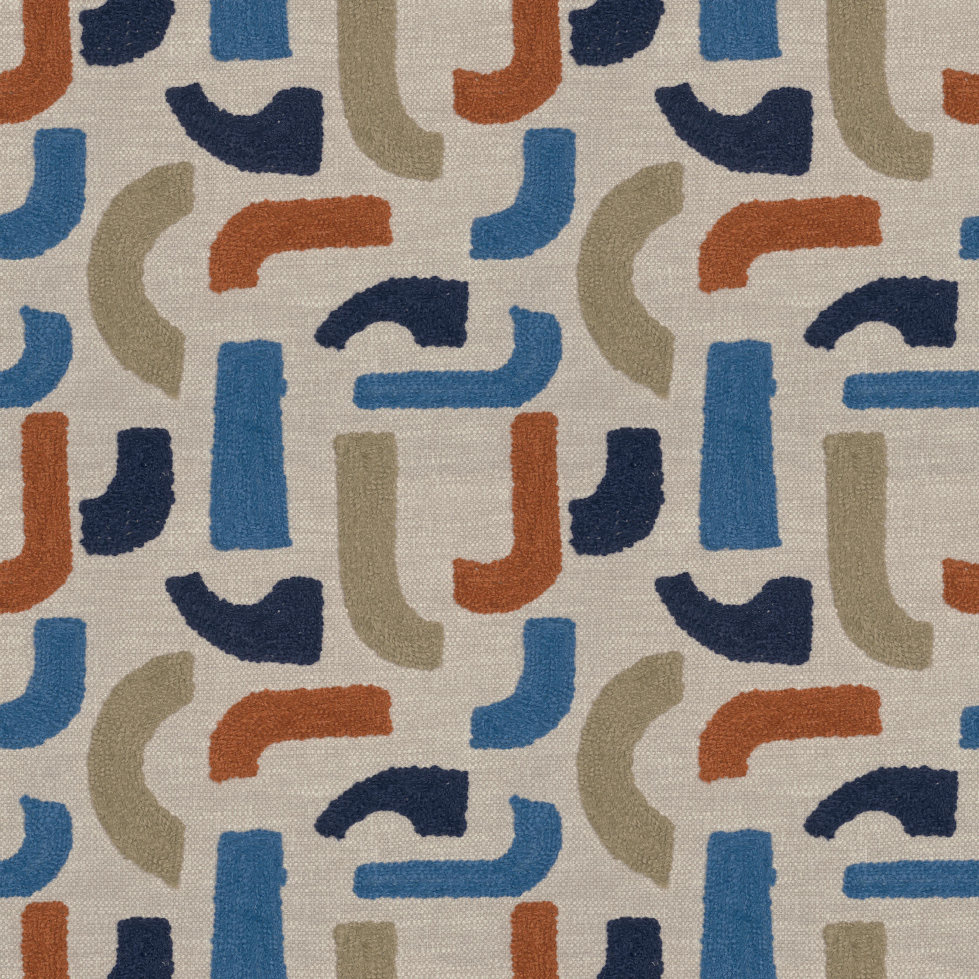 A seamless fabric texture with graphical multicoloured embroidery units arranged in a None pattern