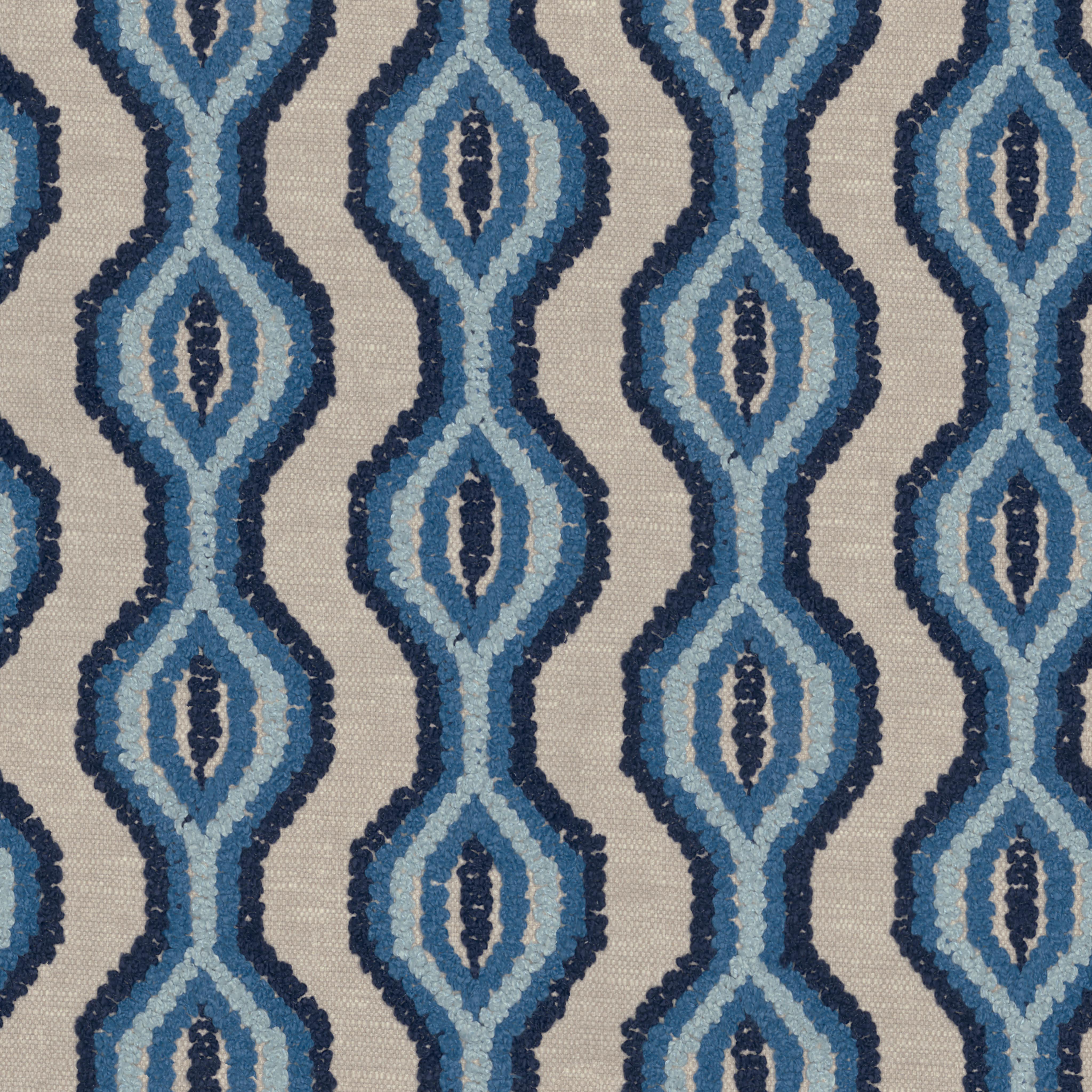 A seamless fabric texture with graphical blue embroidery units arranged in a None pattern