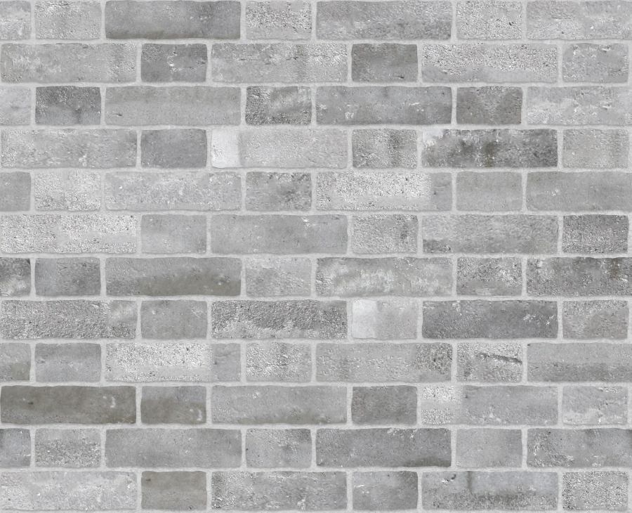 A seamless brick texture with finnish grey brick units arranged in a Staggered pattern