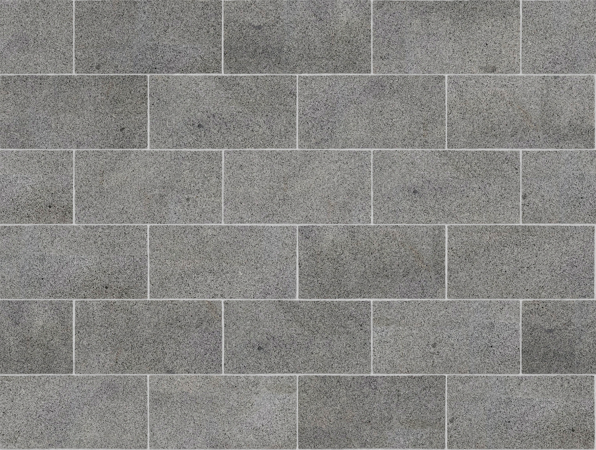 A seamless stone texture with granite blocks arranged in a Stretcher pattern