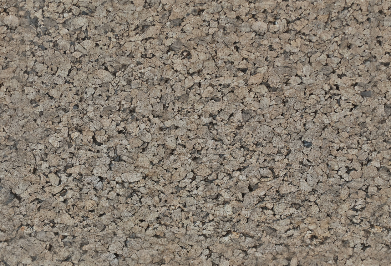 A seamless dark agglomerated cork texture for use in architectural drawings and 3D models
