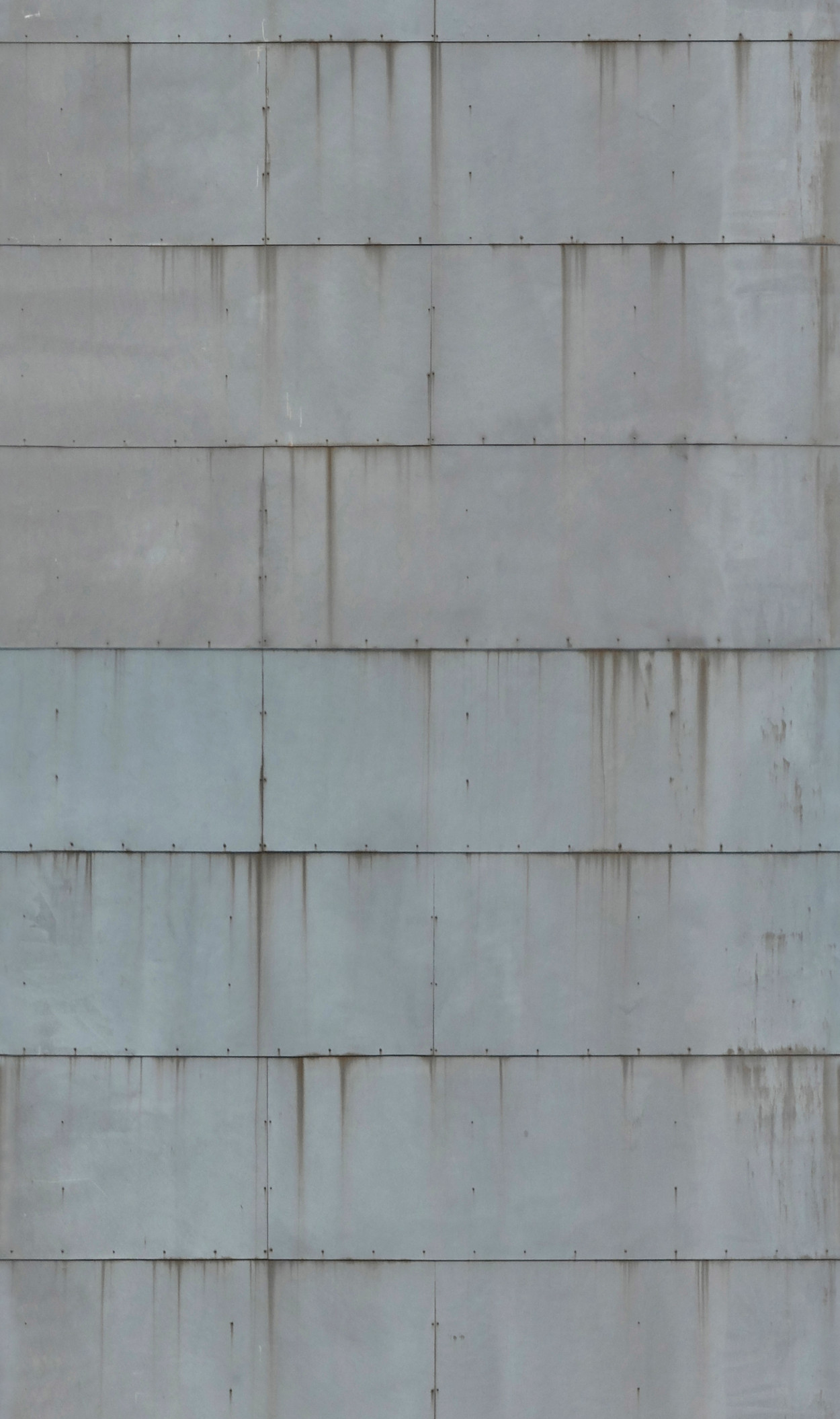 A seamless weathered metal cladding texture for use in architectural drawings and 3D models