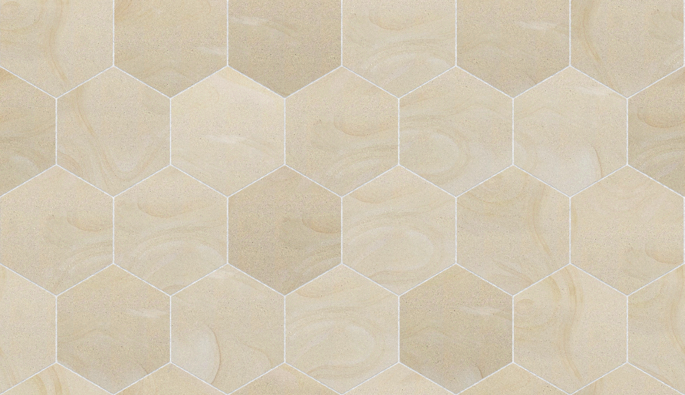 A seamless stone texture with blonde sandstone blocks arranged in a Hexagonal pattern