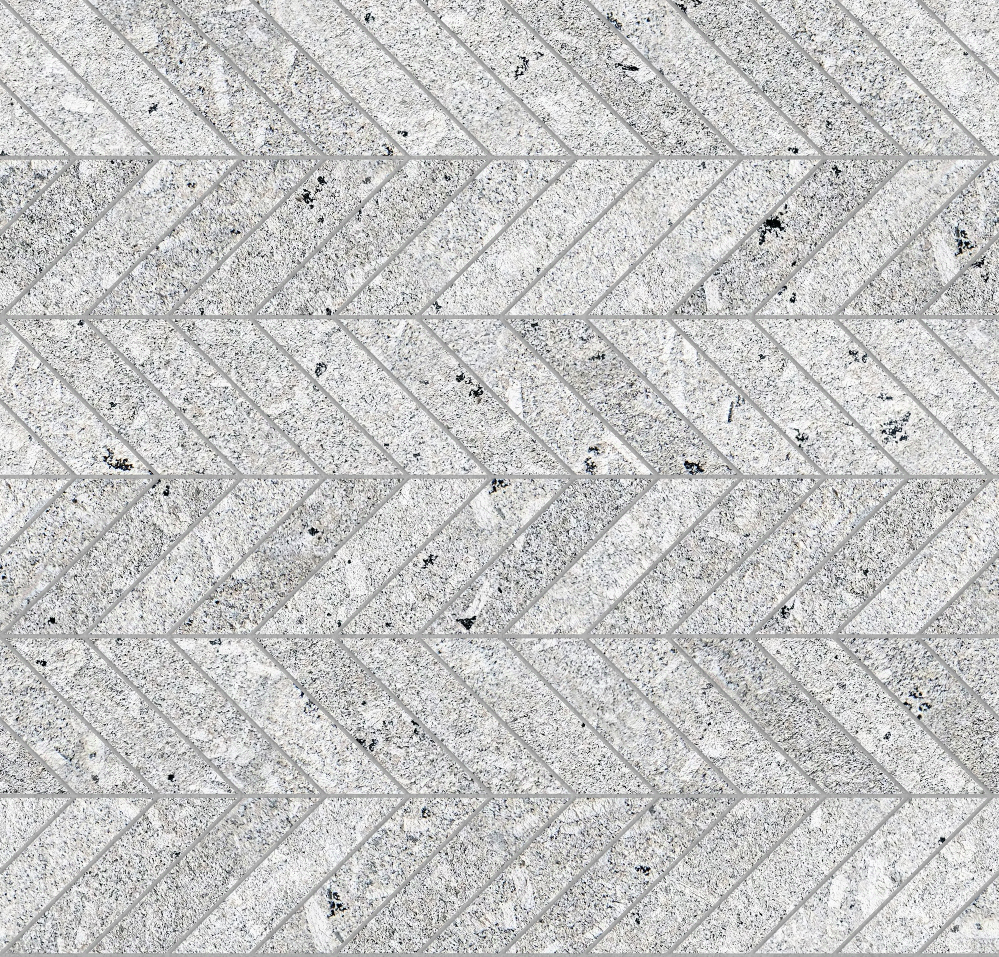 A seamless stone texture with porphyritic granite blocks arranged in a Chevron pattern
