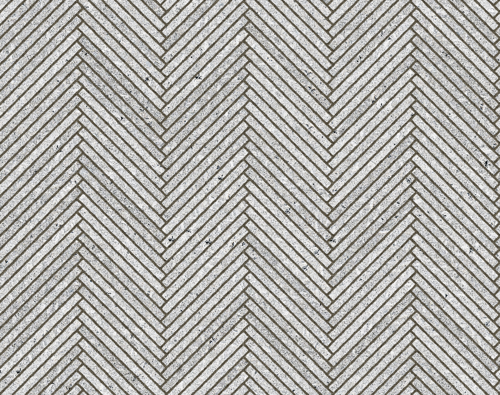 A seamless stone texture with porphyritic granite blocks arranged in a Herringbone pattern