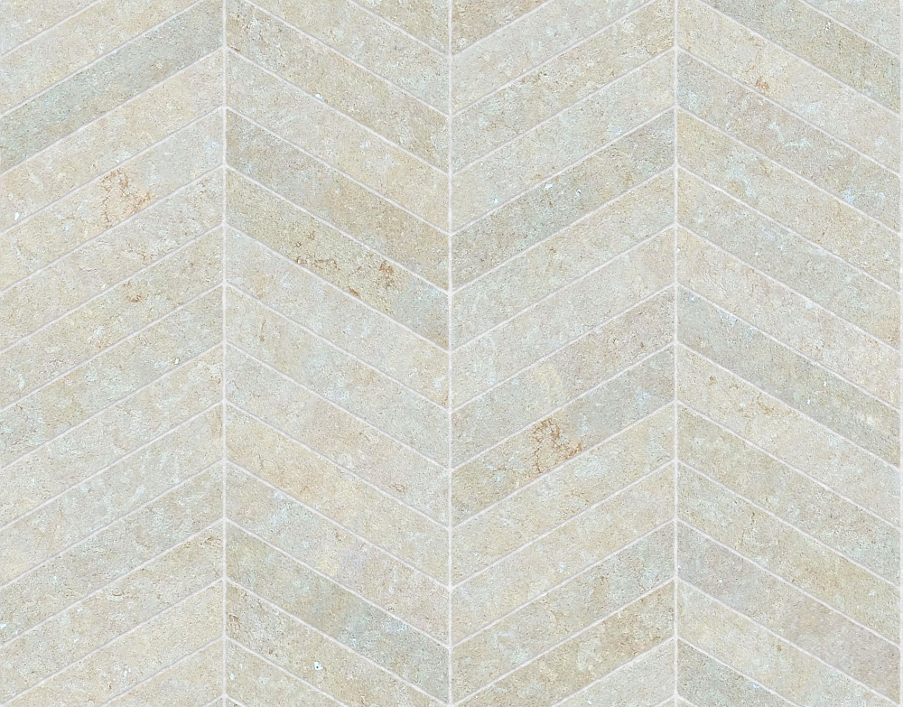A seamless stone texture with reconstituted stone blocks arranged in a Chevron pattern