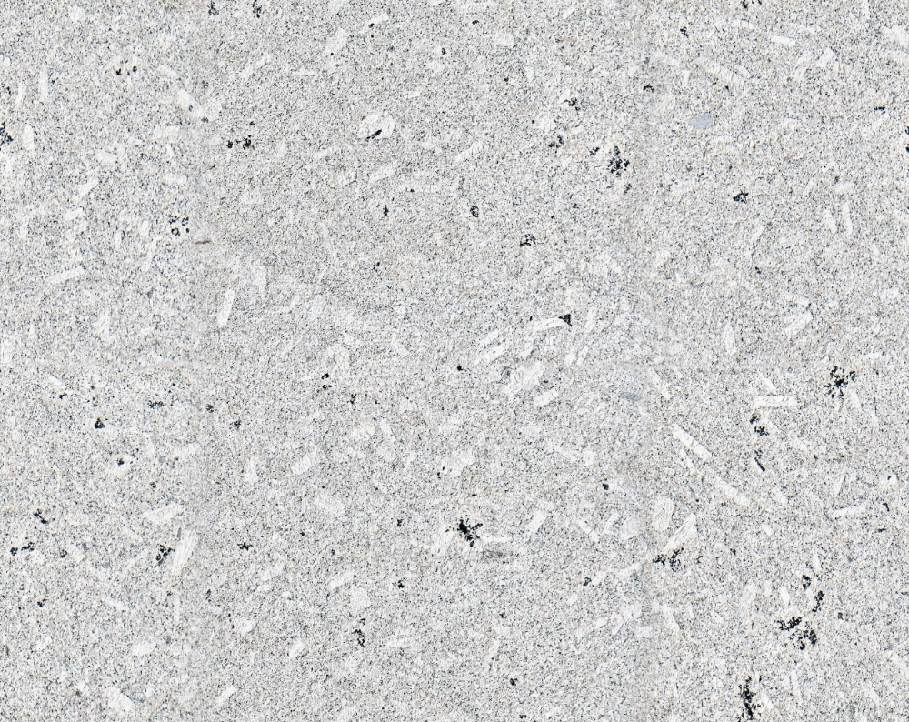 A seamless stone texture with porphyritic granite blocks arranged in a None pattern