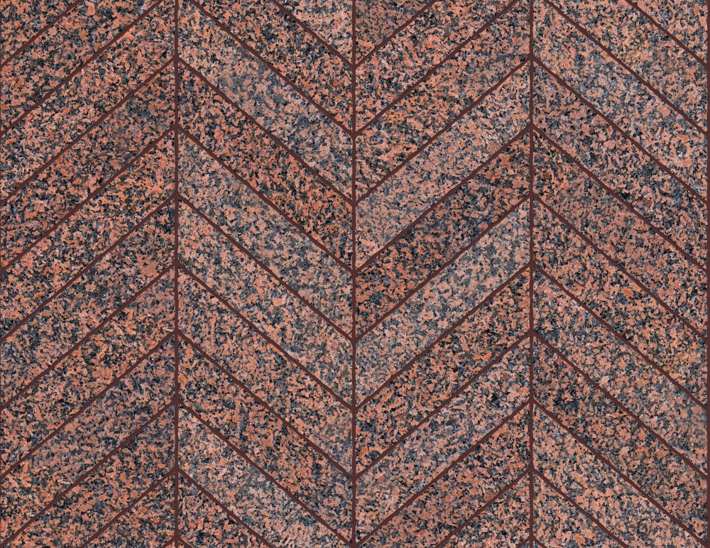 A seamless stone texture with granite blocks arranged in a Chevron pattern