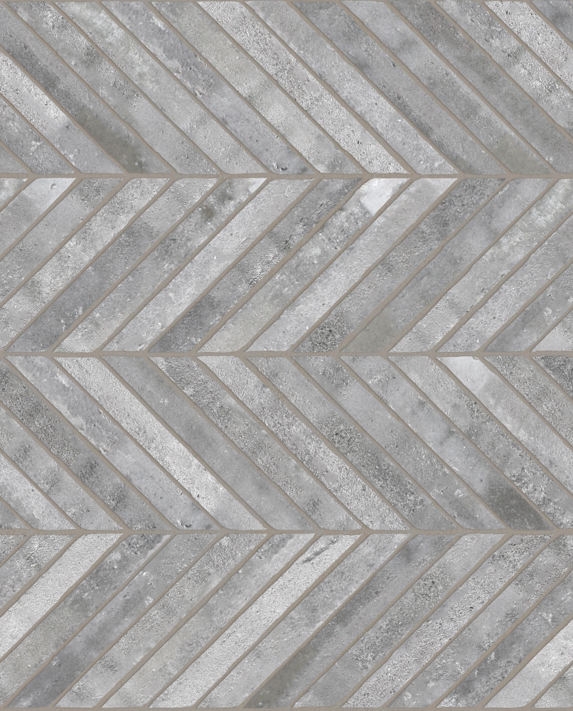 A seamless brick texture with finnish grey brick units arranged in a Chevron pattern