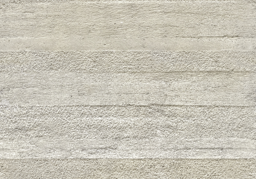A seamless concrete texture with pigmented concrete blocks arranged in a None pattern