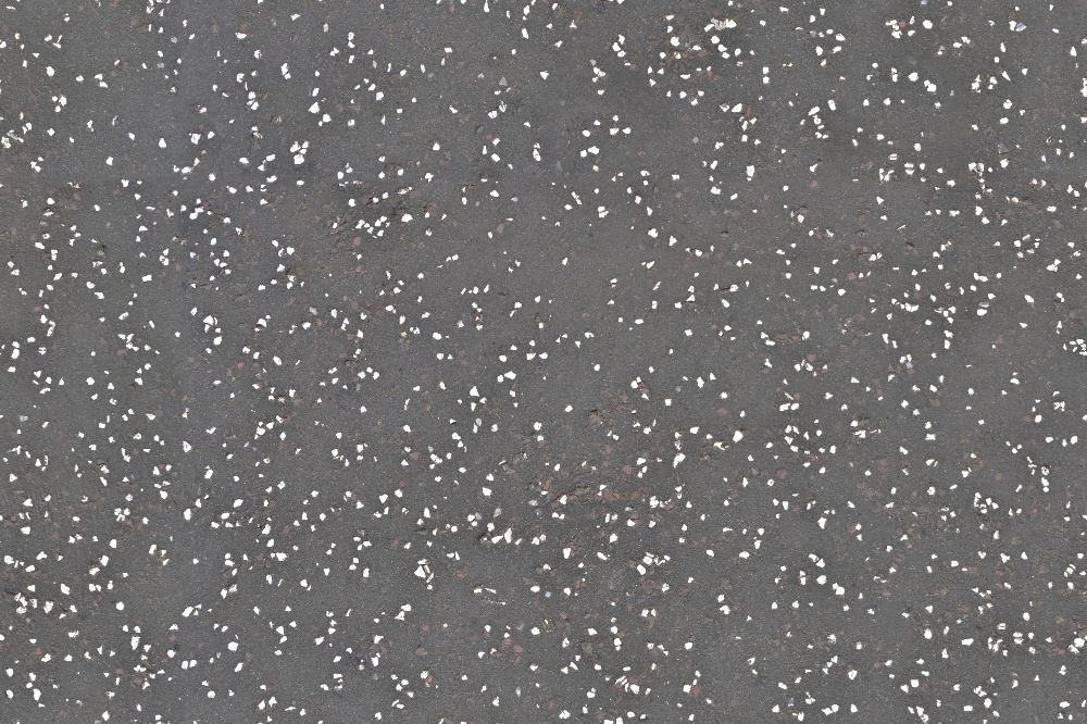 A seamless landscaping texture with crushed stone asphalt units arranged in a None pattern