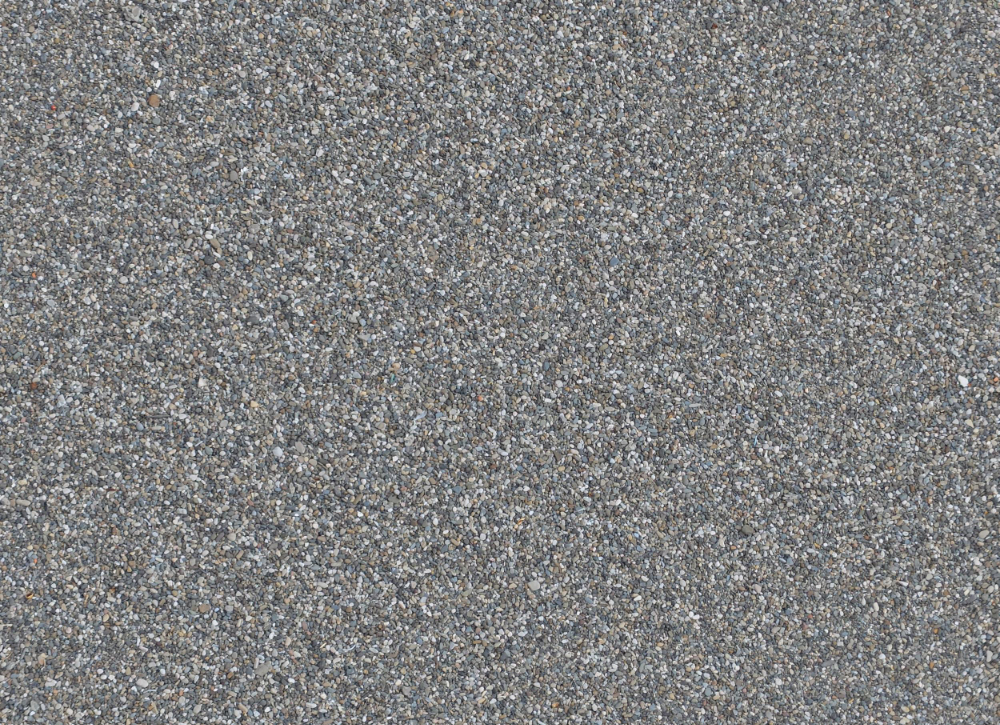 A seamless landscaping texture with gravel units arranged in a None pattern