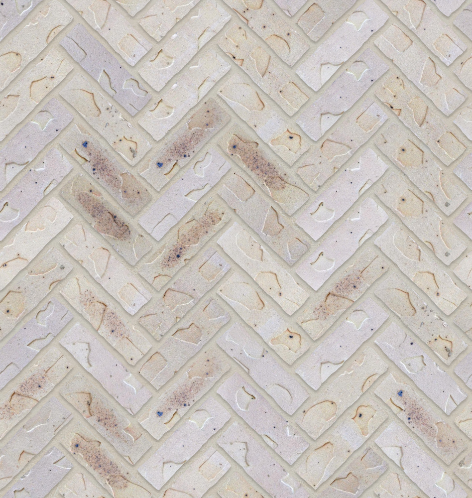 A seamless brick texture with stamped brick units arranged in a Herringbone pattern