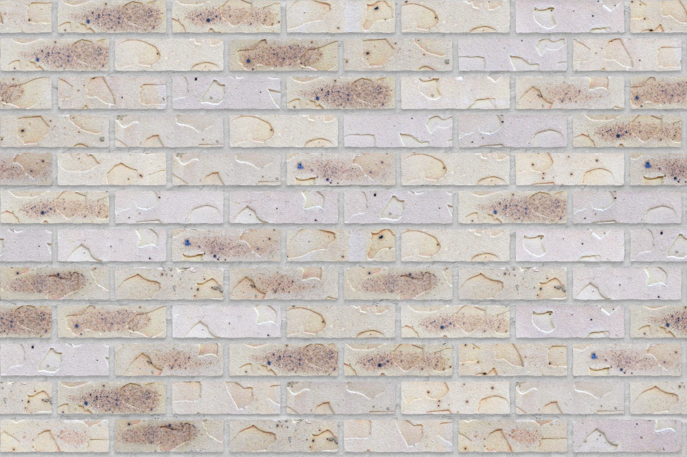 A seamless brick texture with stamped brick units arranged in a Stretcher pattern