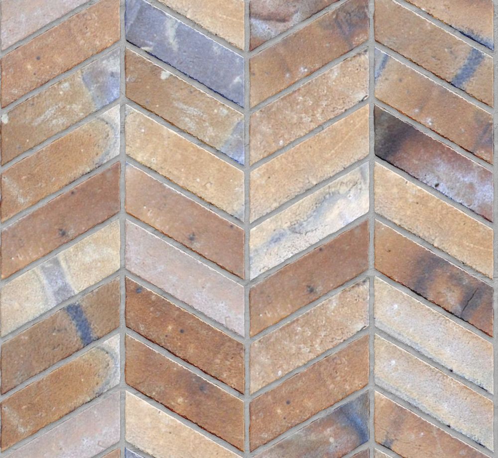 A seamless brick texture with burnt clay bricks units arranged in a Chevron pattern