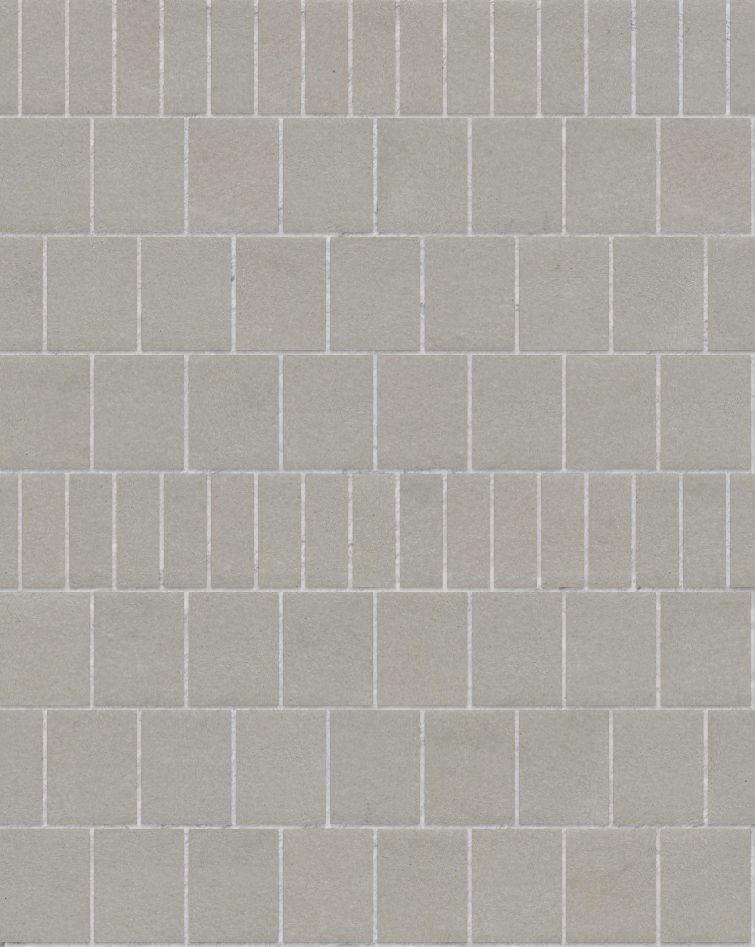 A seamless brick texture with buff porcelain brick units arranged in a Common pattern
