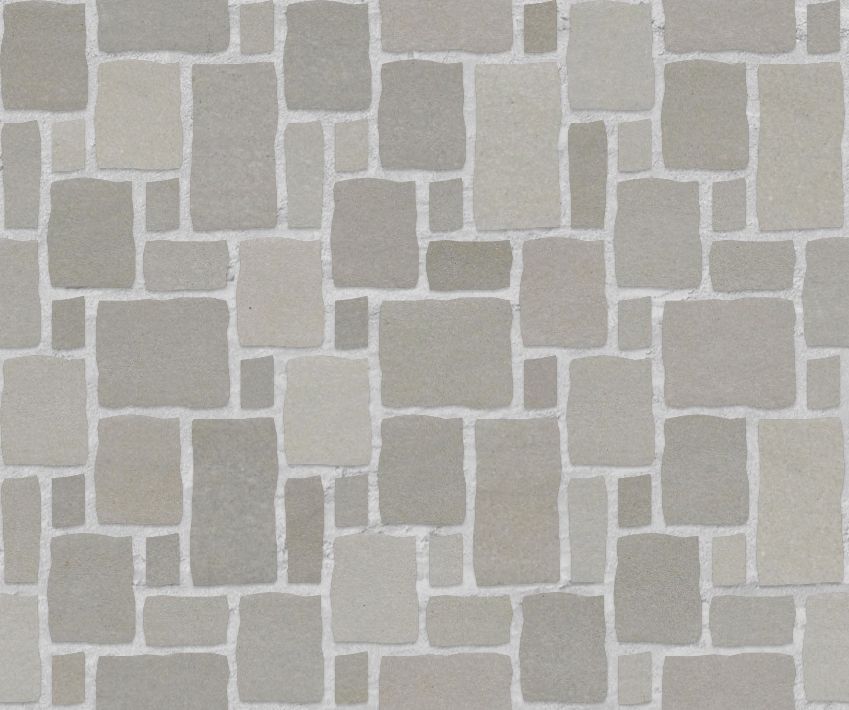 A seamless brick texture with buff porcelain brick units arranged in a French pattern