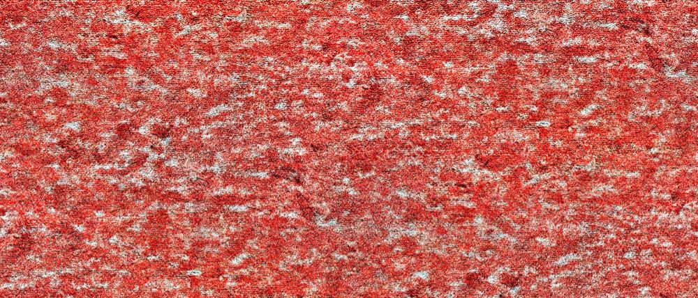 A seamless carpet texture with rouge carpet units arranged in a None pattern