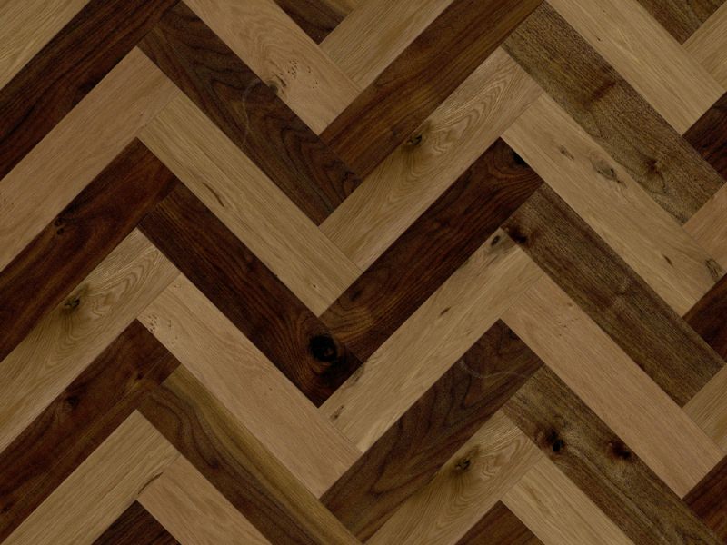 A seamless wood texture with walnut  boards arranged in a Herringbone pattern