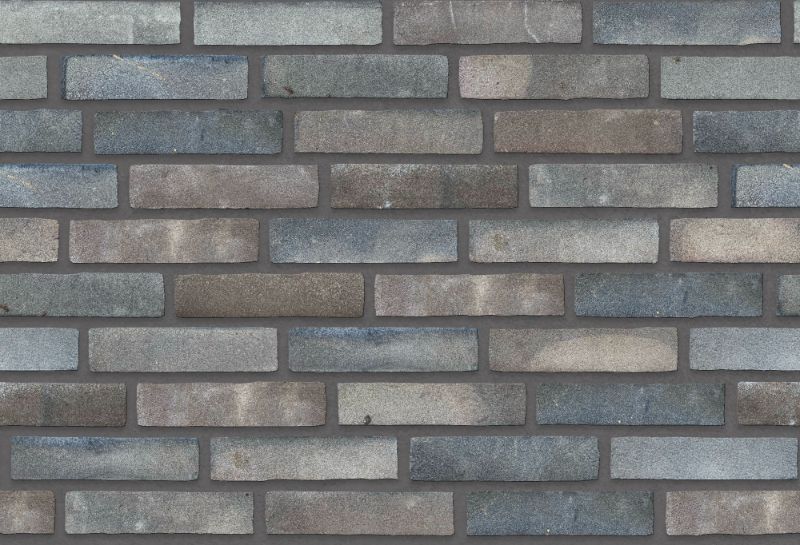 A seamless brick texture with blackpepper / raw units arranged in a  pattern