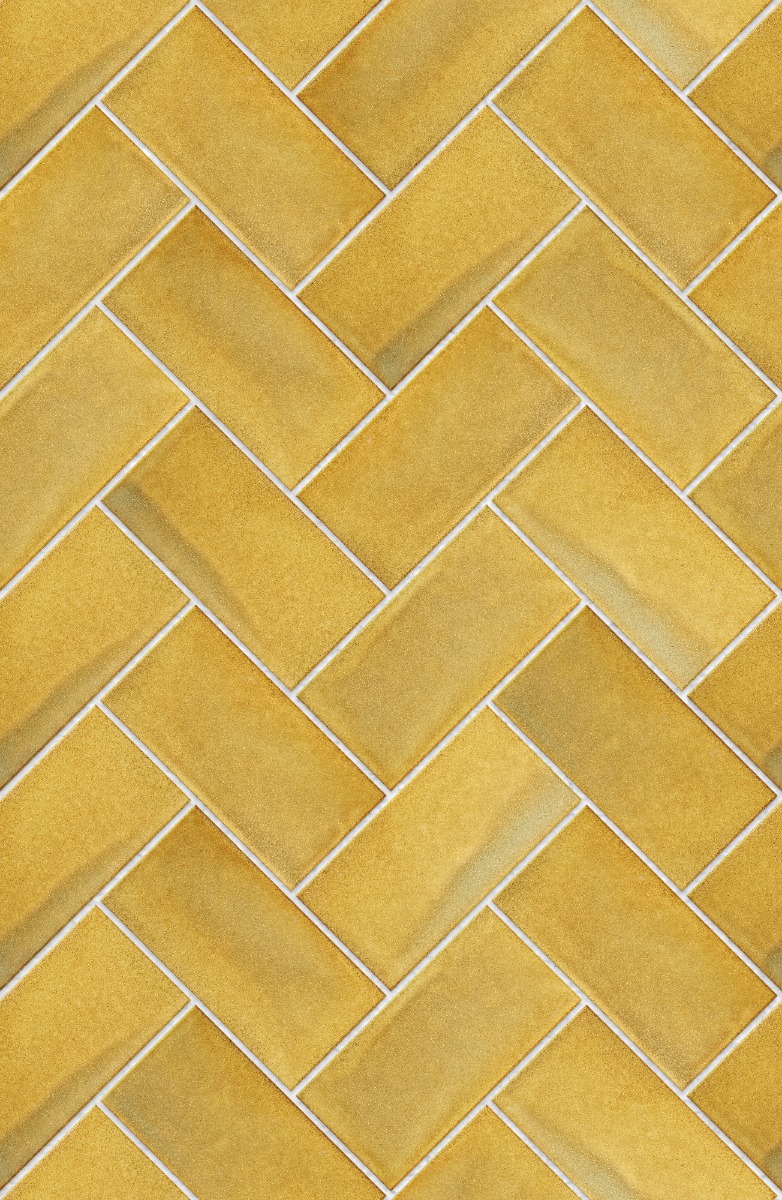 A seamless tile texture with ignorance is bliss fe20m_2 tiles arranged in a Herringbone pattern