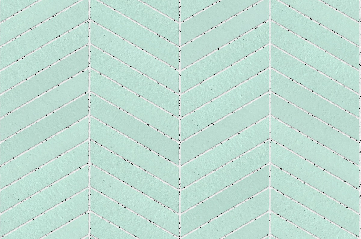 A seamless brick texture with mint green brick units arranged in a Chevron pattern