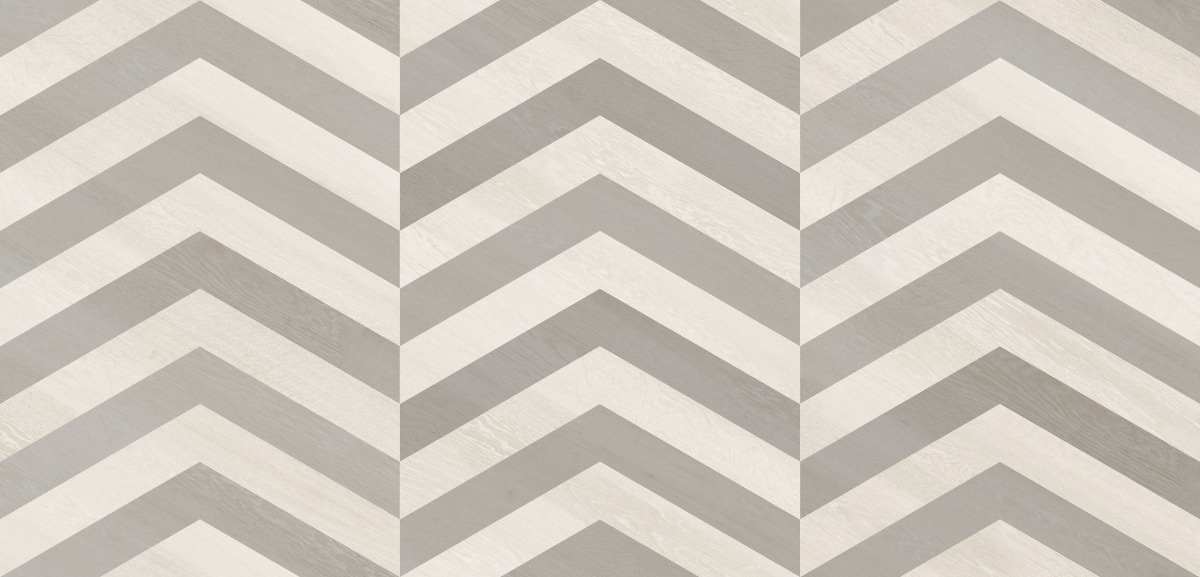A seamless wood texture with white oiled timber boards arranged in a True Chevron pattern