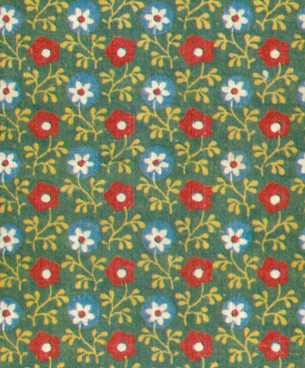 A seamless fabric texture with daisy and poppy cotton fabric units arranged in a None pattern