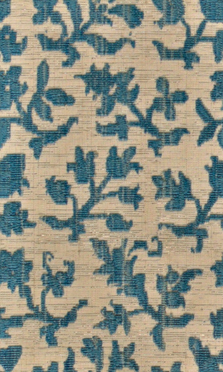 A seamless fabric texture with flower and sprig silk velvet units arranged in a None pattern