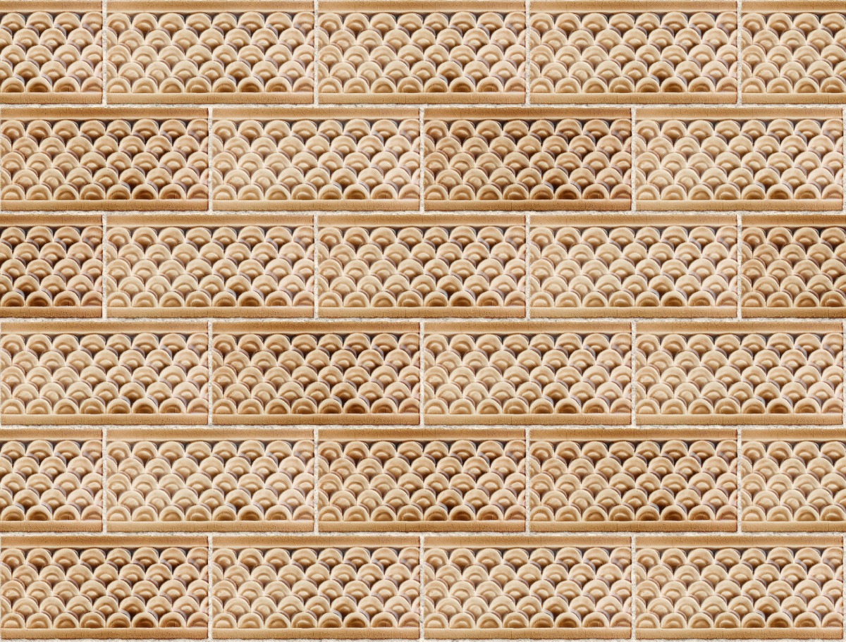 A seamless tile texture with scallop tile tiles arranged in a Stretcher pattern