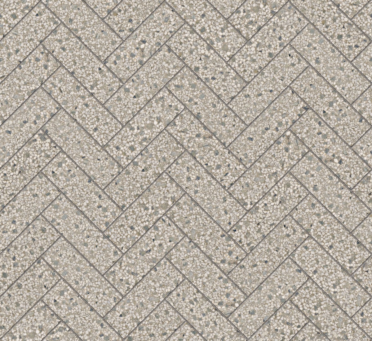 A seamless terrazzo texture with greige terrazzo units arranged in a Herringbone pattern