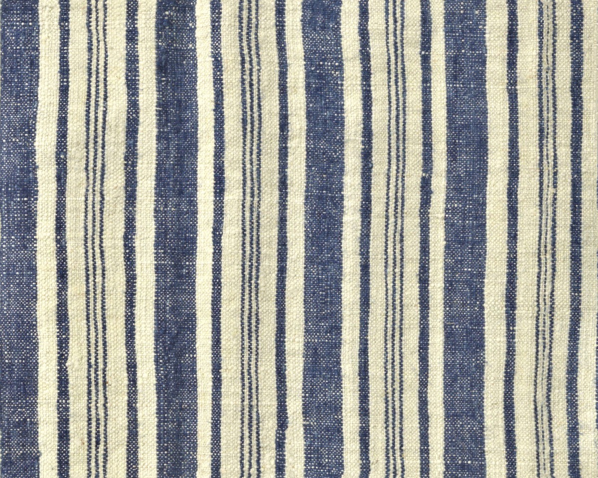 A seamless fabric texture with striped cotton fabric units arranged in a None pattern