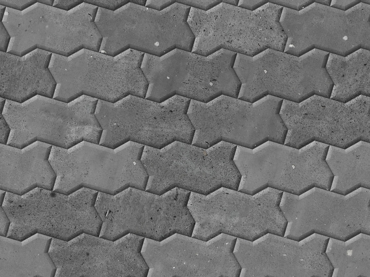 A seamless stone texture with basalt blocks arranged in a Zig Zag Pavers pattern