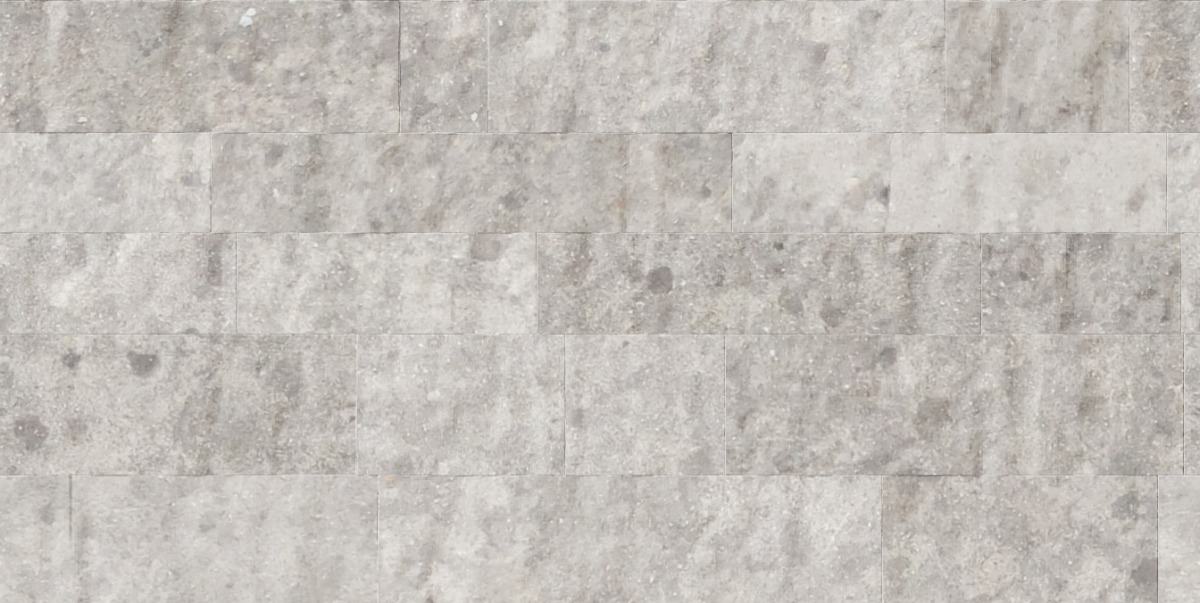A seamless concrete texture with concrete blocks arranged in a Ashlar pattern