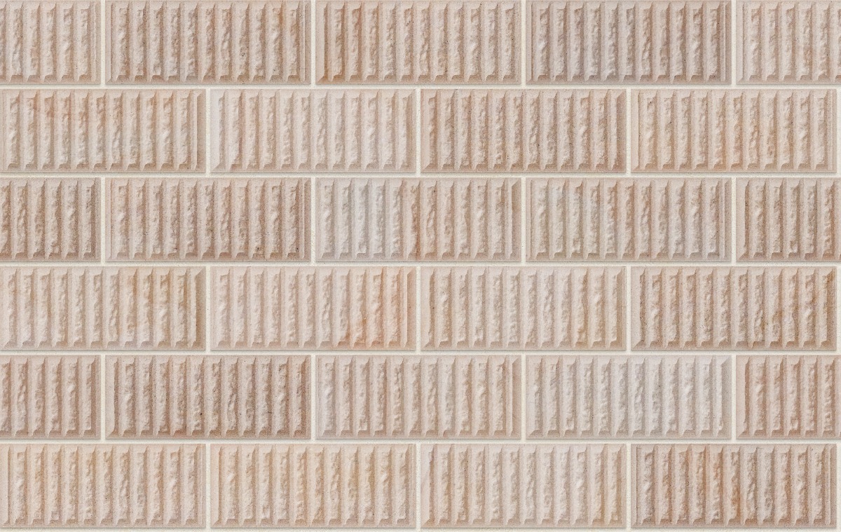 A seamless stone texture with blonde sandstone blocks arranged in a Stretcher pattern