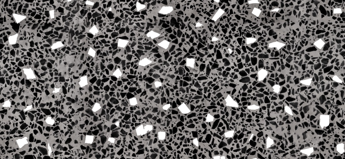 A seamless terrazzo texture with terrazzo artico units arranged in a None pattern