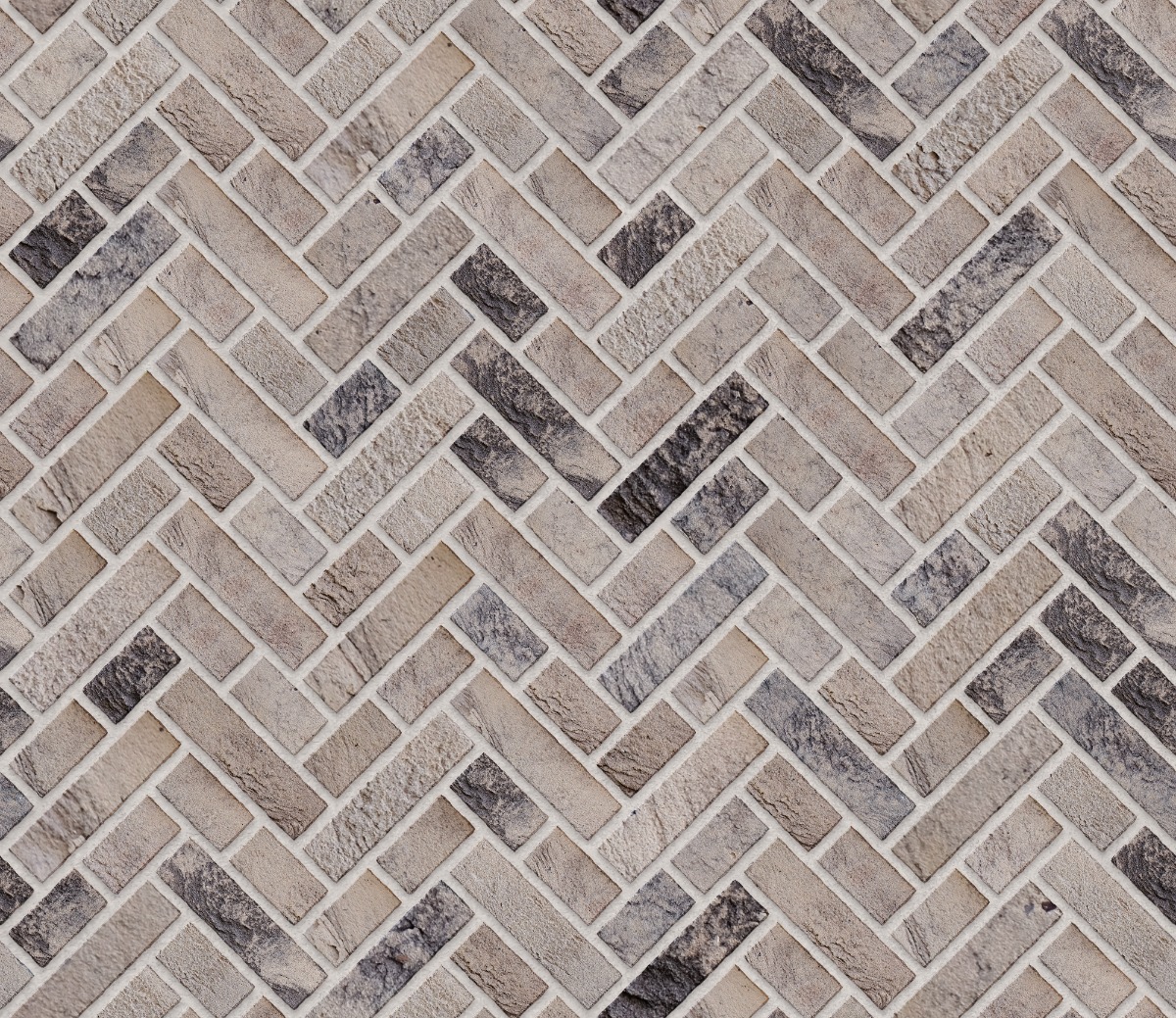 A seamless brick texture with beige brick units arranged in a Broken Herringbone pattern