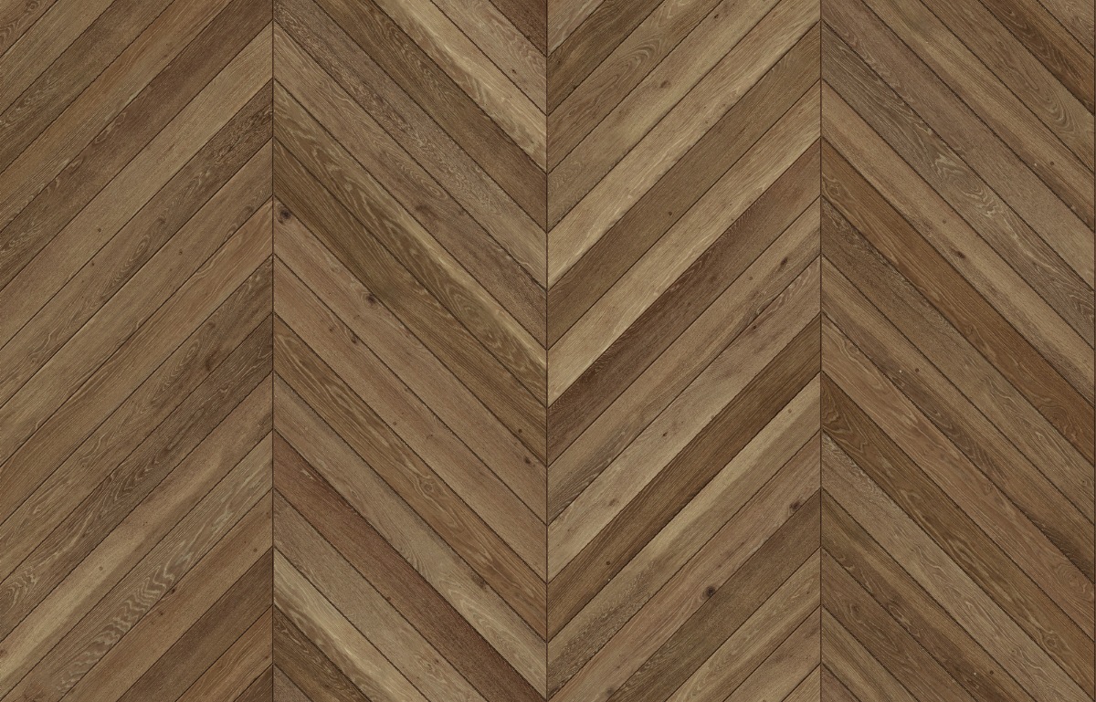 A seamless wood texture with stained timber boards arranged in a Chevron pattern