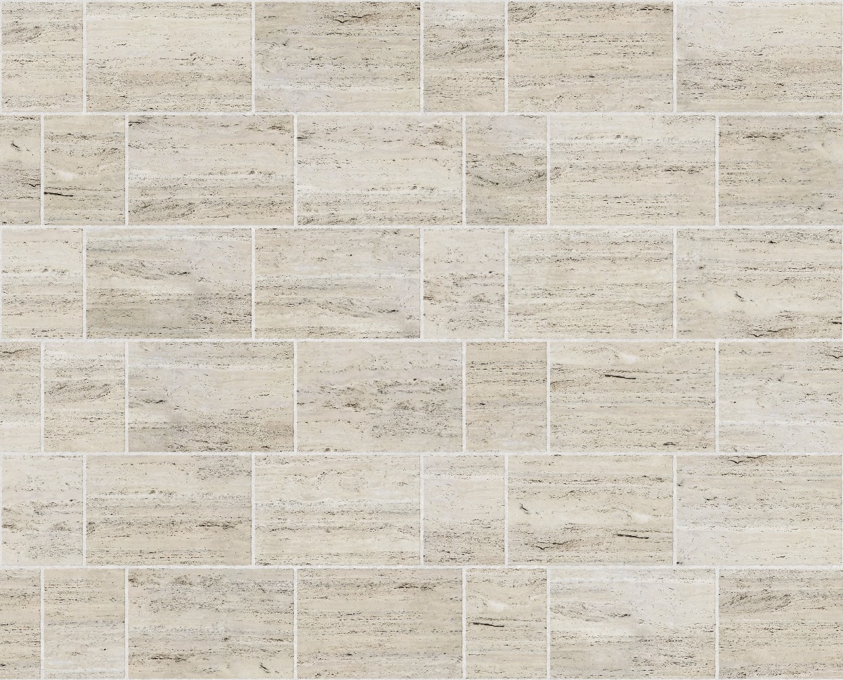 A seamless stone texture with travertine blocks arranged in a Silesian Bond pattern