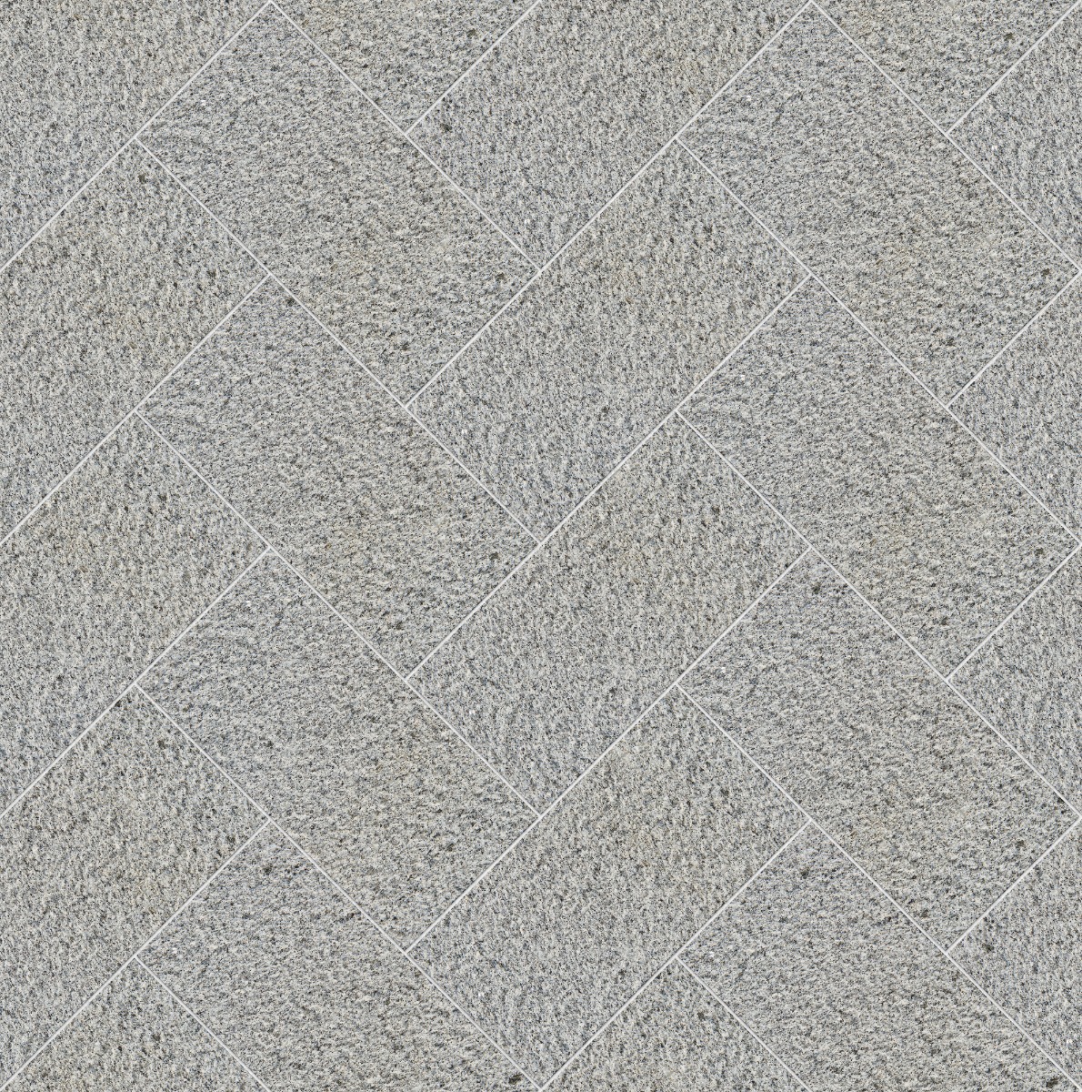 A seamless stone texture with silva montemuro cinza - bush hammered blocks arranged in a Herringbone pattern