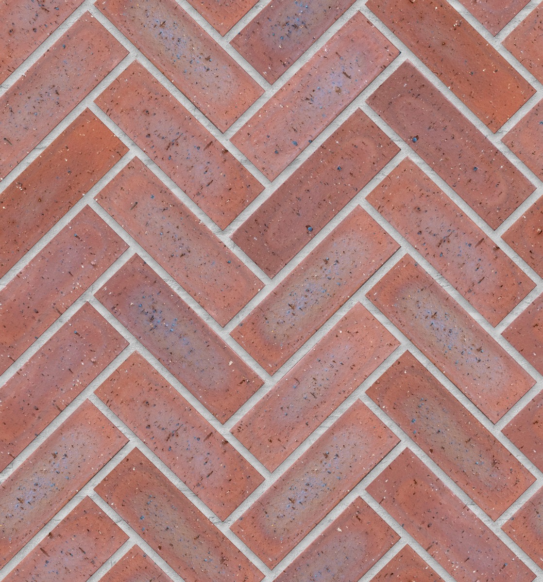 A seamless brick texture with country classic travertine fbs units arranged in a Herringbone pattern