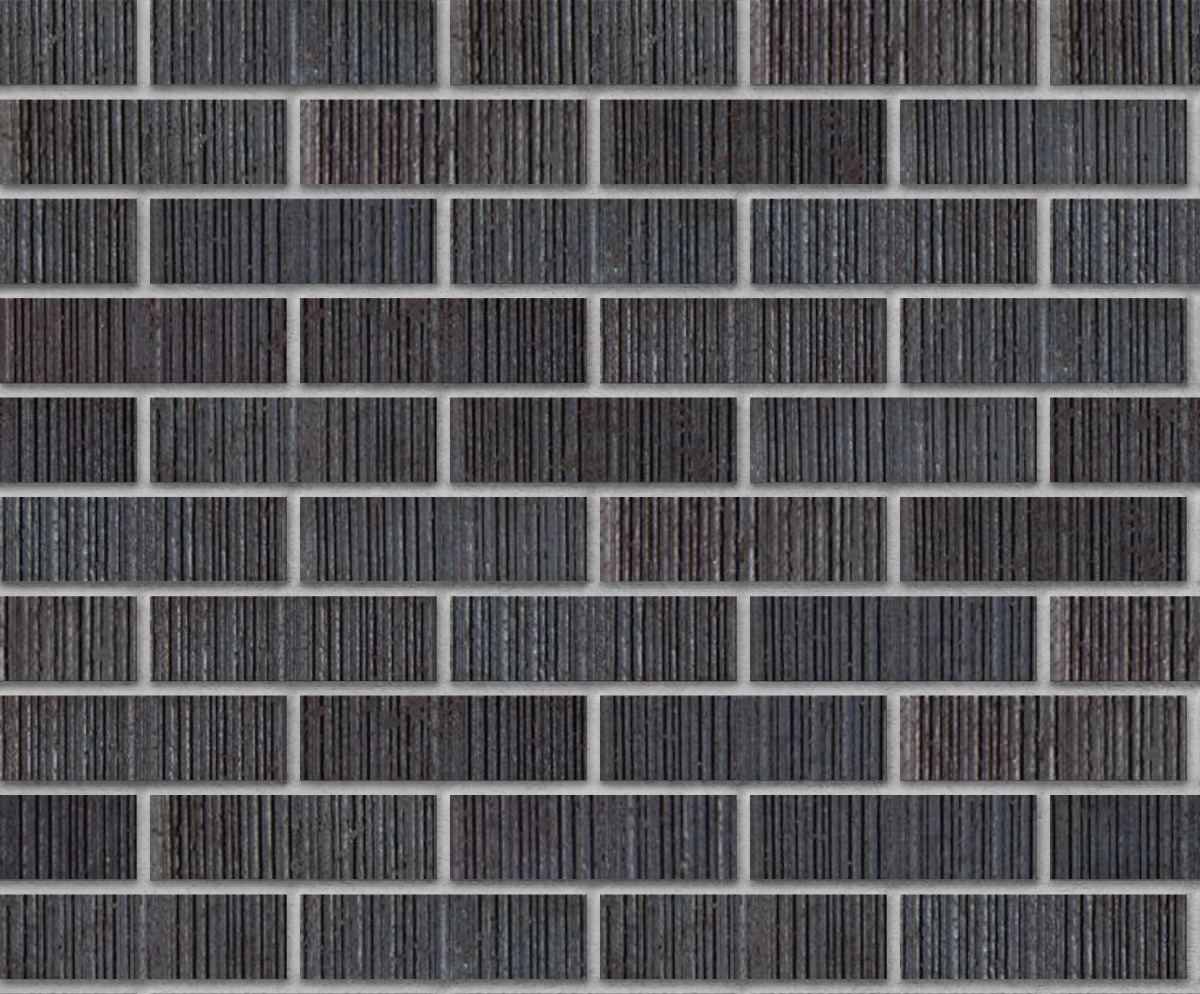 A seamless brick texture with dark ironspot vertical score facebrick modular units arranged in a Stretcher pattern