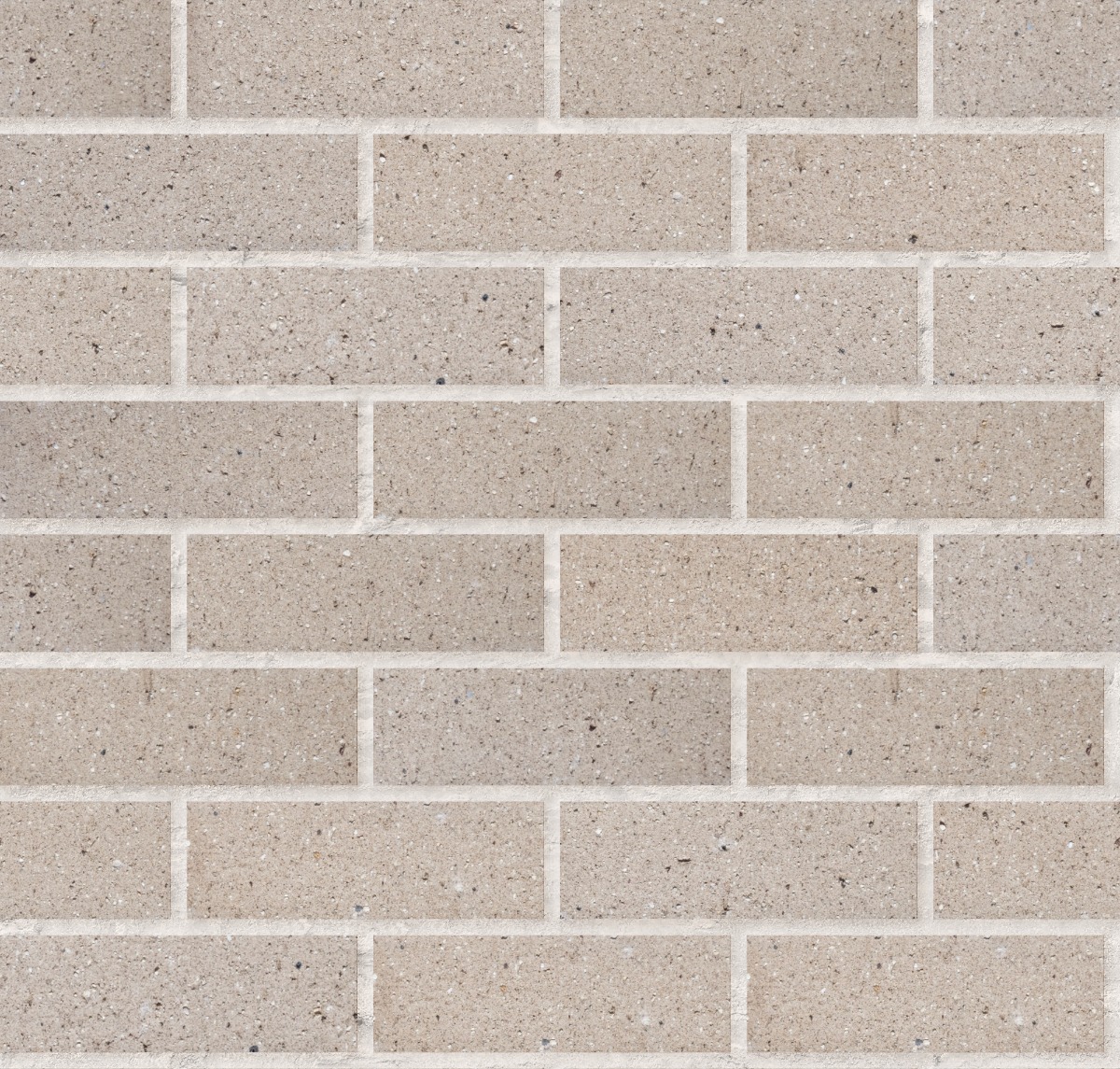 A seamless brick texture with silvergrey travertine fbx units arranged in a Stretcher pattern