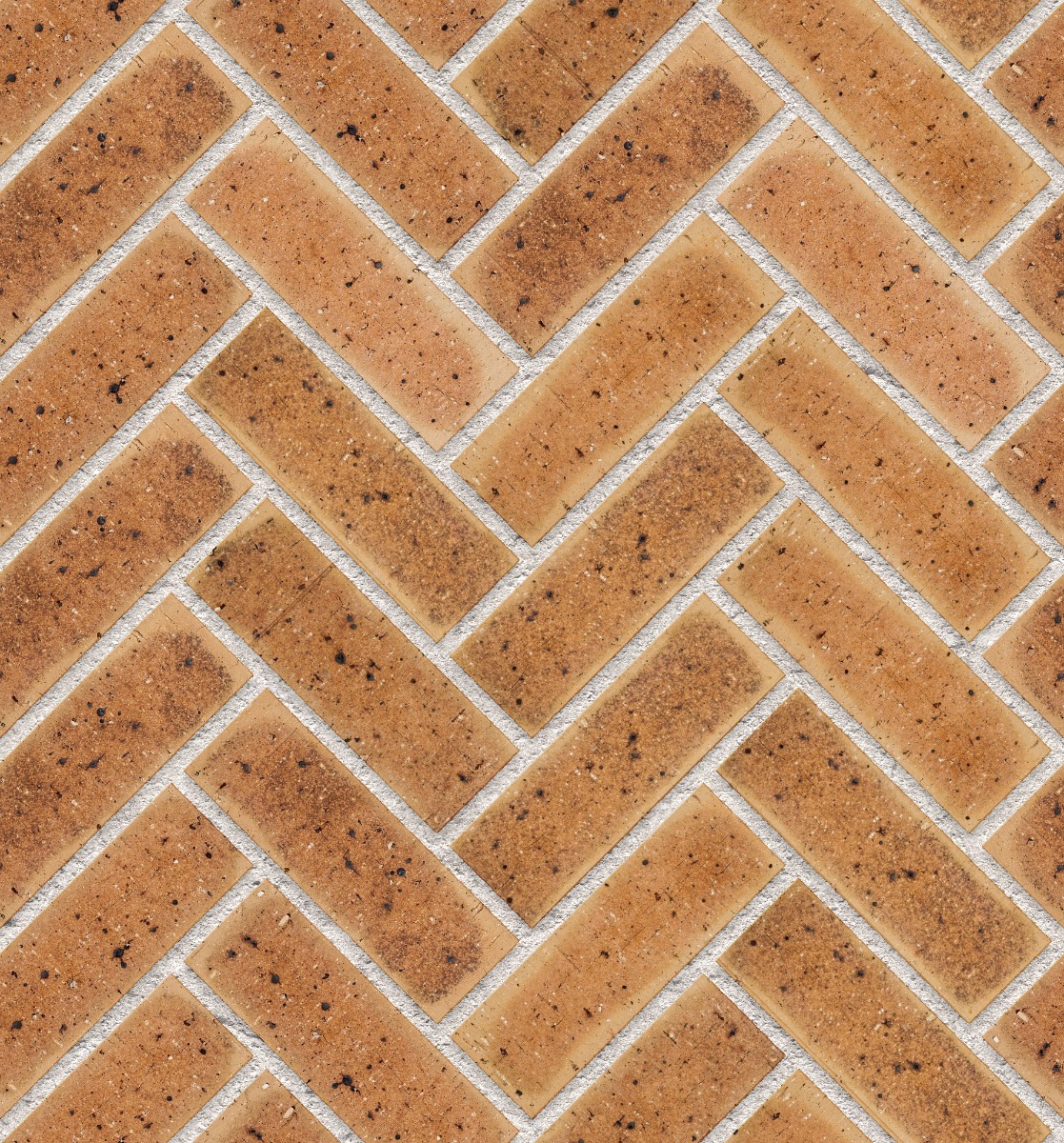 A seamless brick texture with autumn wheat travertine fbs units arranged in a Herringbone pattern