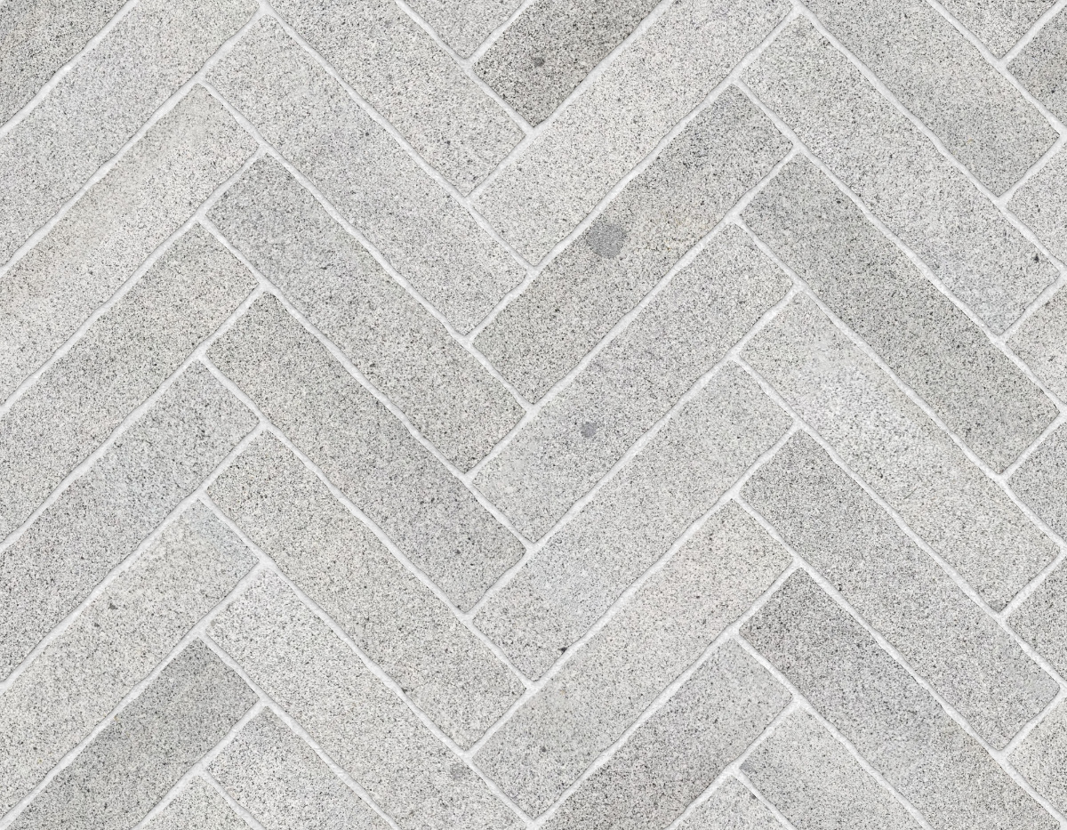 A seamless stone texture with test positioning blocks arranged in a Herringbone pattern