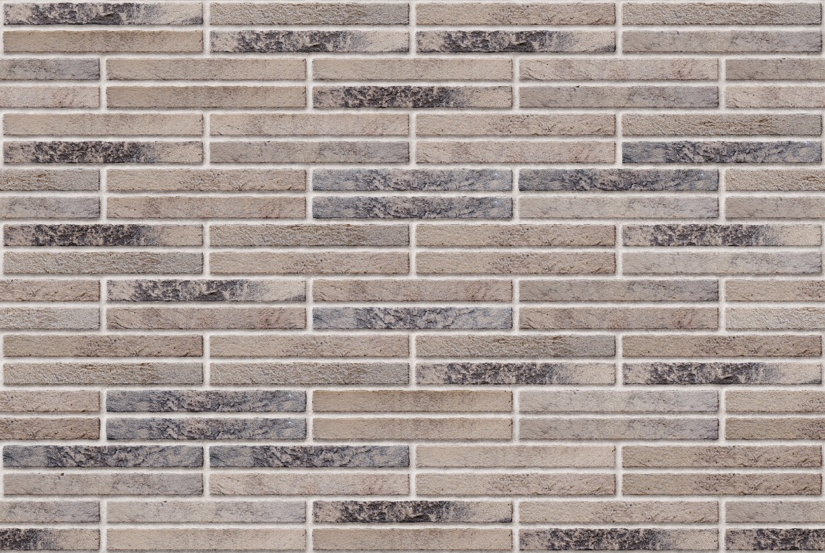 A seamless brick texture with beige brick units arranged in a Double Stretcher pattern